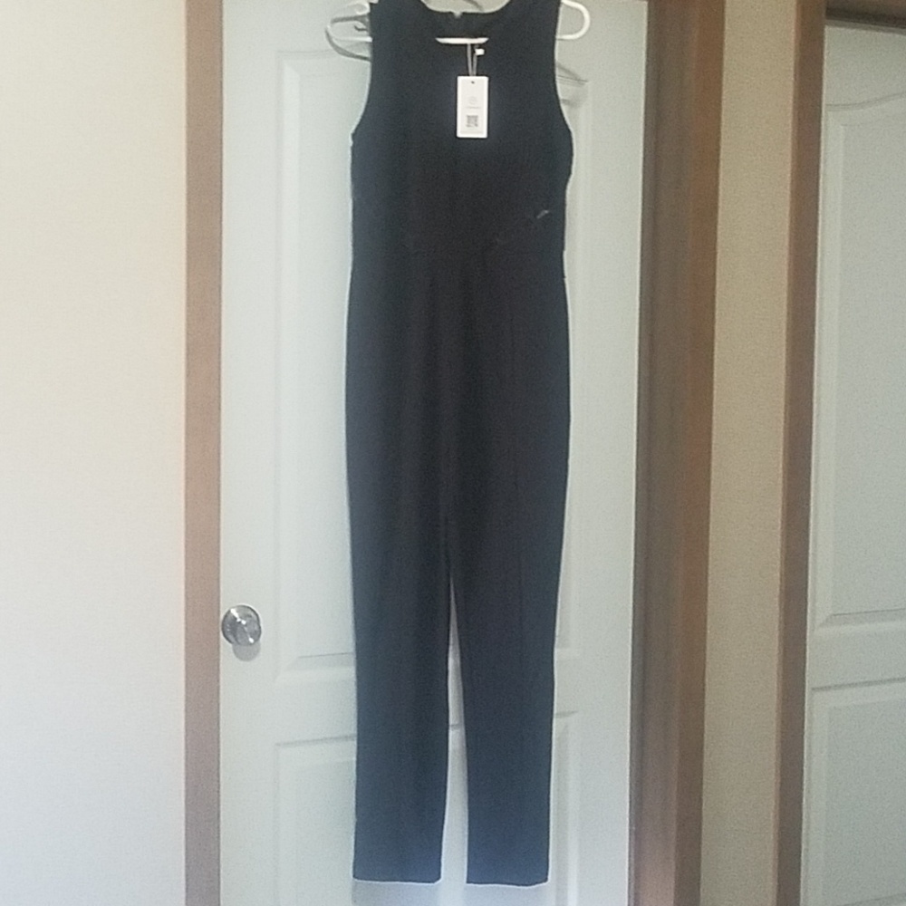 Black sleeveless jumpsuit
